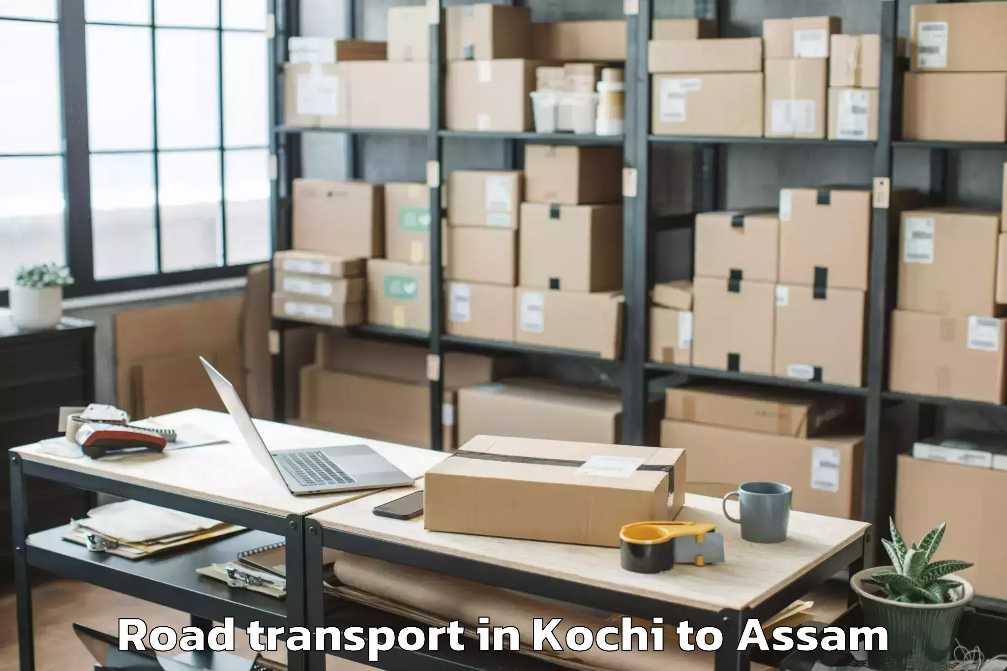 Book Kochi to Bilasipara Pt Road Transport Online